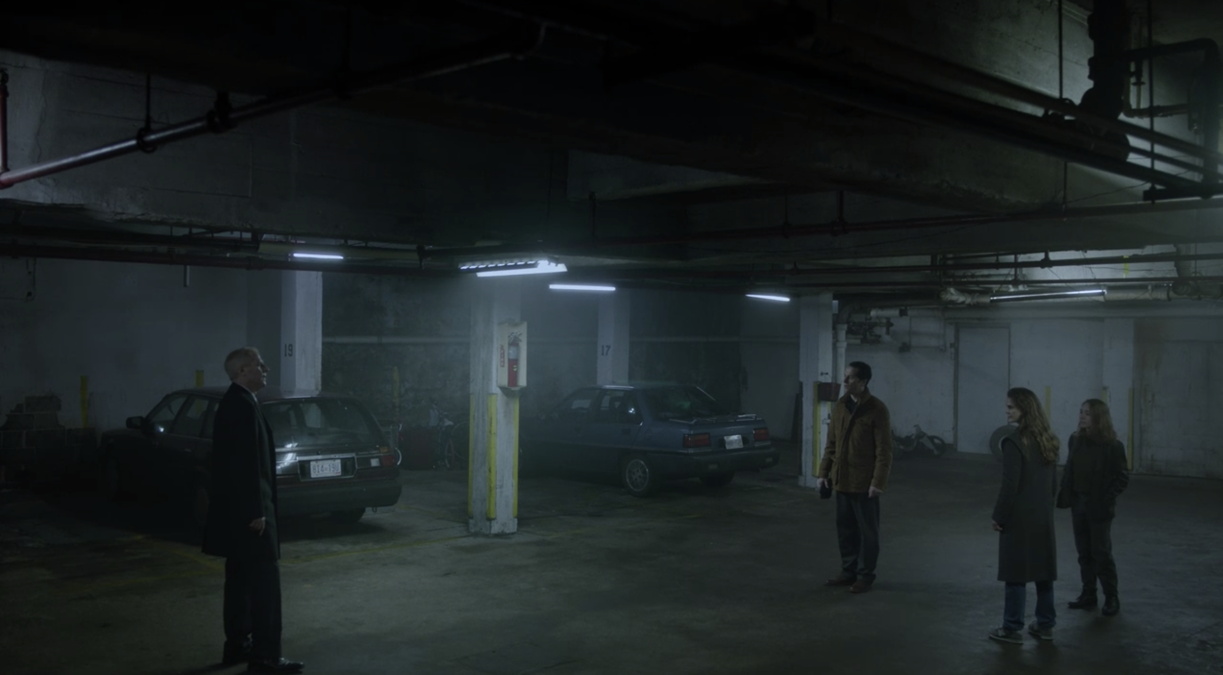 Stan (Noah Emmerich) confronts the Jenningses in the parking garage.